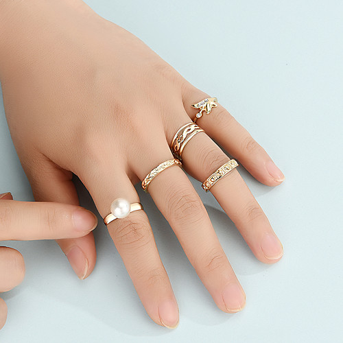 Ring Set European And American Personality Geometric Hollow Twist-Shaped Pearl Alloy 5pc Joint Ring Set
Ring Set European And American Personality Geometric Hollow Twist-Shaped Pearl Alloy 5pc Joint Ring Set