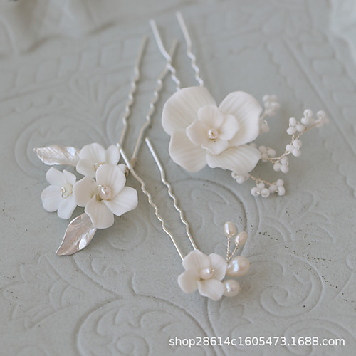 cold wind hard porcelain flower hair fork hairpin flower bridal headdress beautiful romantic european-style wedding dress wear beaded hair accessories
cold wind hard porcelain flower hair fork hairpin flower bridal headdress beautiful romantic european-style wedding dress wear beaded hair accessories