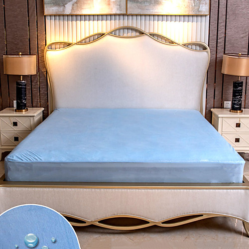 Bamboo fiber towels waterproof bed pure color terry cloth mattress on the bed.
Bamboo fiber towels waterproof bed pure color terry cloth mattress on the bed.