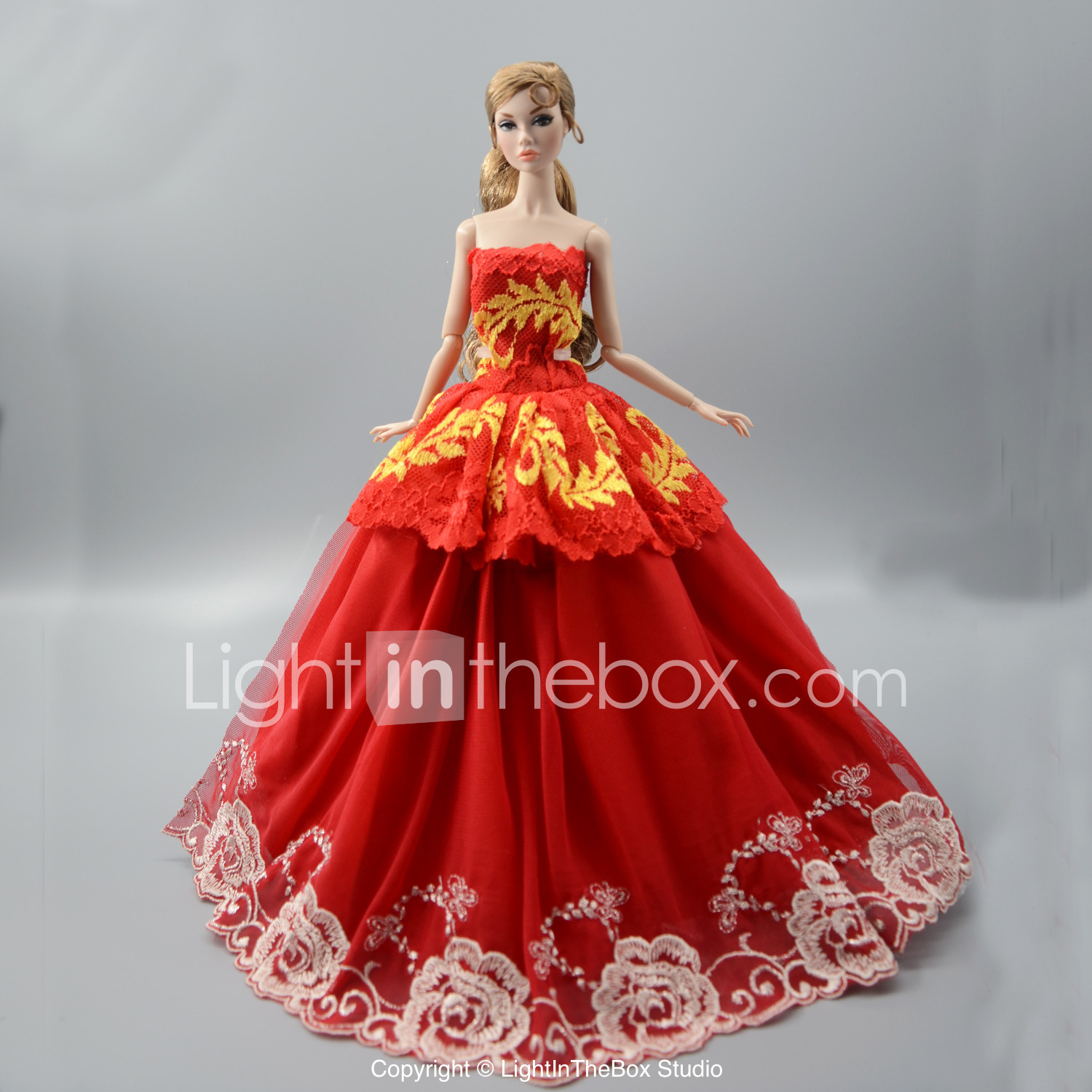 barbie doll in red dress