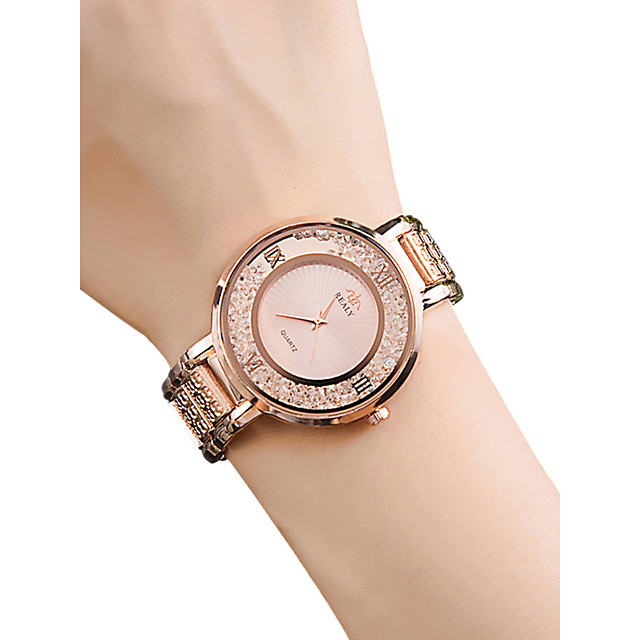 rose gold watch on wrist